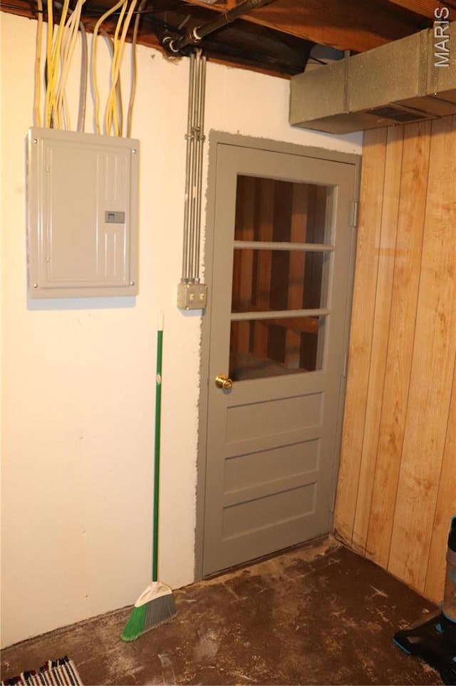 unfinished basement with electric panel