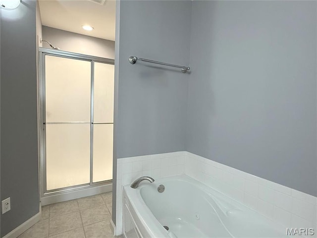 bathroom with a stall shower, a whirlpool tub, tile patterned flooring, baseboards, and recessed lighting