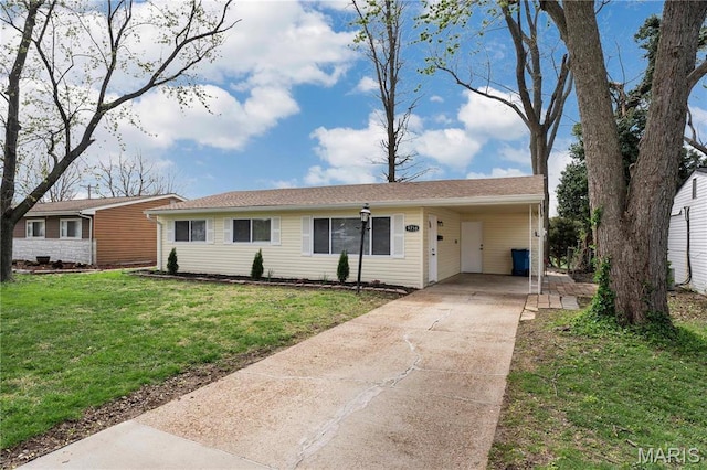 9738 Traverse Ln, Saint Louis, MO 63134 - ranch-style home with driveway, a front lawn, and an attached carport