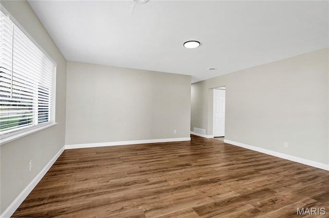 9738 Traverse Ln, Saint Louis, MO 63134 - empty room with wood finished floors and baseboards