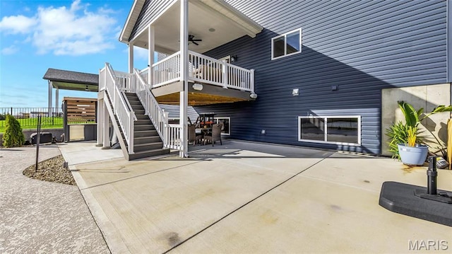 back of house featuring a patio area, stairway, a deck, ceiling fan, and fence