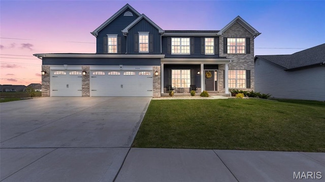 view of front facade with concrete driveway, a lawn, board and batten siding, a garage, and covered porch