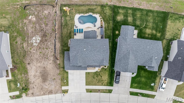 view of subject property featuring a pool