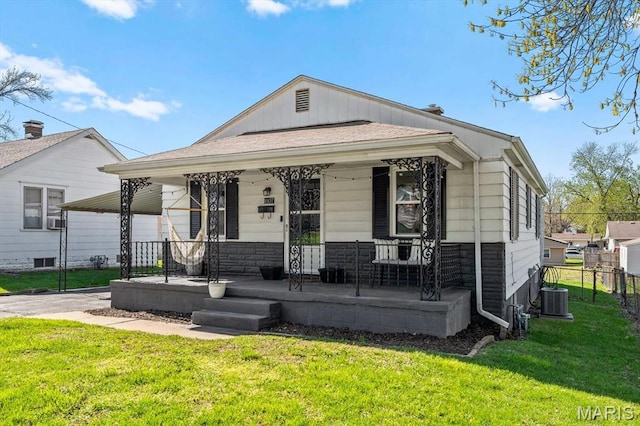 view of front of home featuring a porch and cooling unit