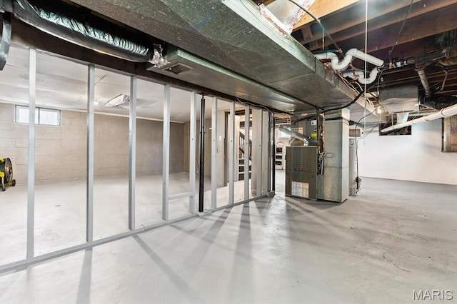 below grade area featuring heating unit
