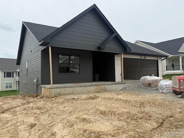 2253 Heywood Mdws, Cape Girardeau, MO 63701 - view of front of house featuring covered porch, a garage, and driveway