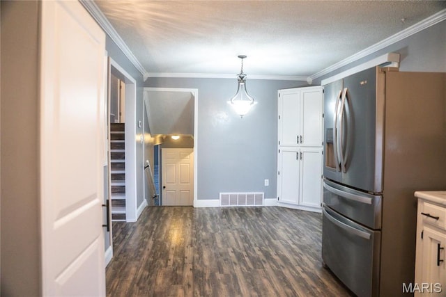 kitchen with stainless steel fridge with ice dispenser, dark wood-style floors, white cabinets, pendant lighting, and crown molding