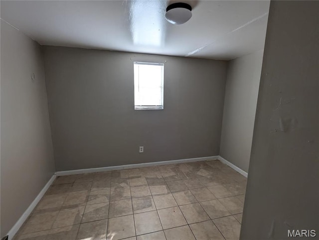 4610 Pope Ave, Saint Louis, MO 63115 - spare room featuring baseboards