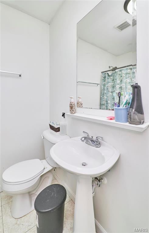 595 Cap Au Gris St, Troy, MO 63379 - bathroom with toilet and a shower with curtain