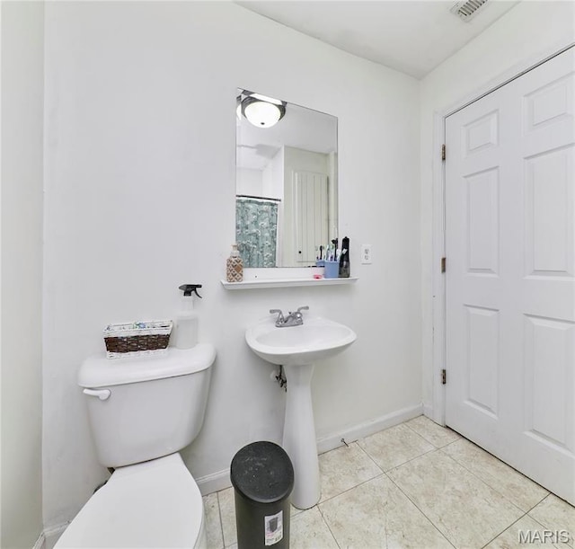 595 Cap Au Gris St, Troy, MO 63379 - full bath featuring baseboards, toilet, and tile patterned flooring