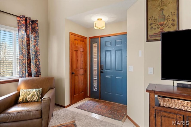 1009 Hemingway Ln Unit H, Weldon Spring, MO 63304 - foyer featuring baseboards and light tile patterned floors