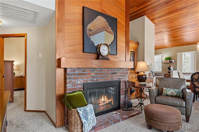 1009 Hemingway Ln Unit H, Weldon Spring, MO 63304 - living room with carpet, a brick fireplace, and baseboards