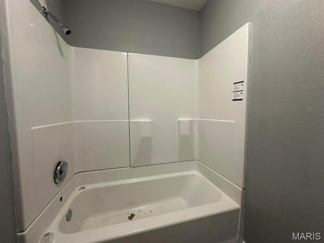 bathroom with shower / bathtub combination