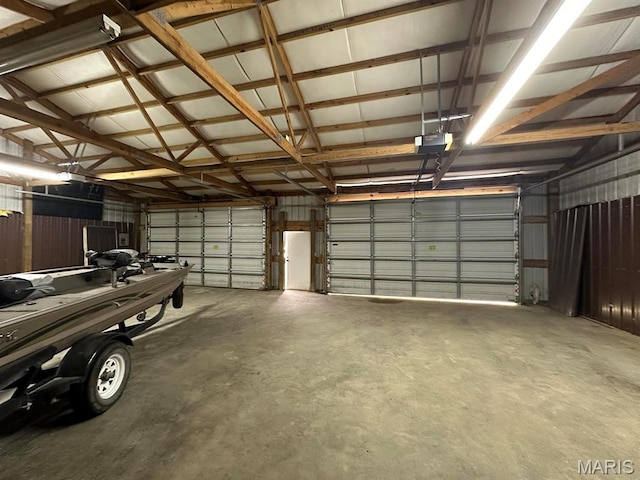 garage featuring a garage door opener