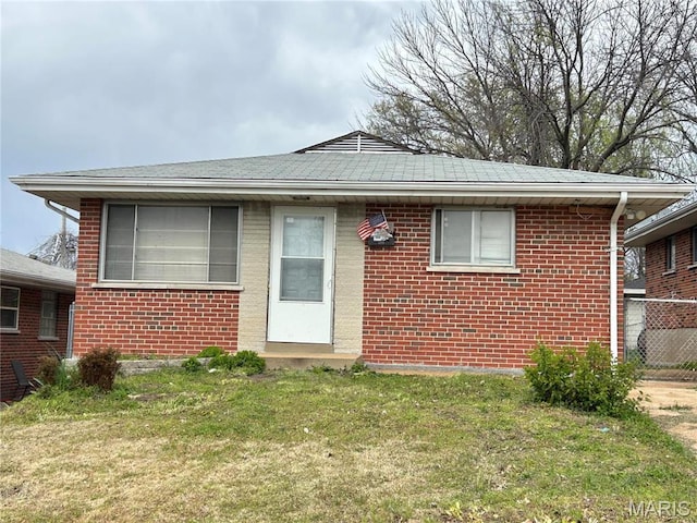3757 Itaska St, Saint Louis, MO 63116 - bungalow-style home with a front yard and brick siding