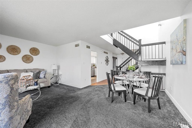 1747 Russet Valley Dr, Saint Louis, MO 63146 - carpeted dining space with stairs, baseboards, and a textured ceiling