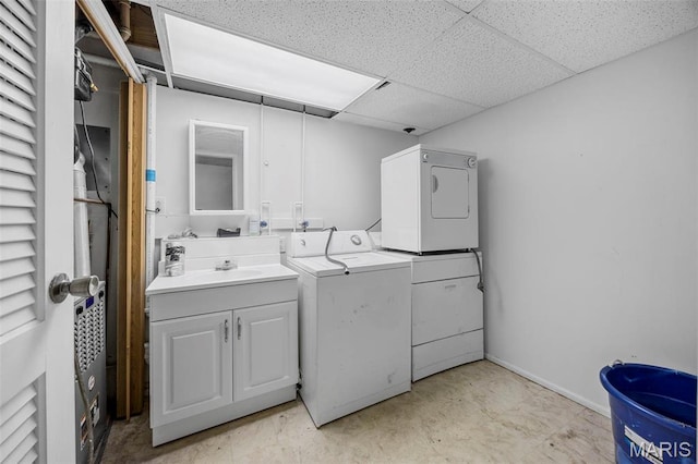 1747 Russet Valley Dr, Saint Louis, MO 63146 - washroom featuring cabinet space, washing machine and clothes dryer, and baseboards
