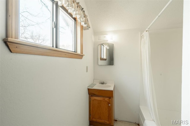 124 Wayne 527, Greenville, MO 63944 - bathroom featuring a shower with shower curtain, a textured ceiling, and vanity