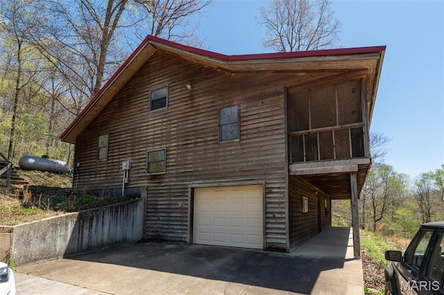 124 Wayne 527, Greenville, MO 63944 - view of home's exterior with a garage and concrete driveway