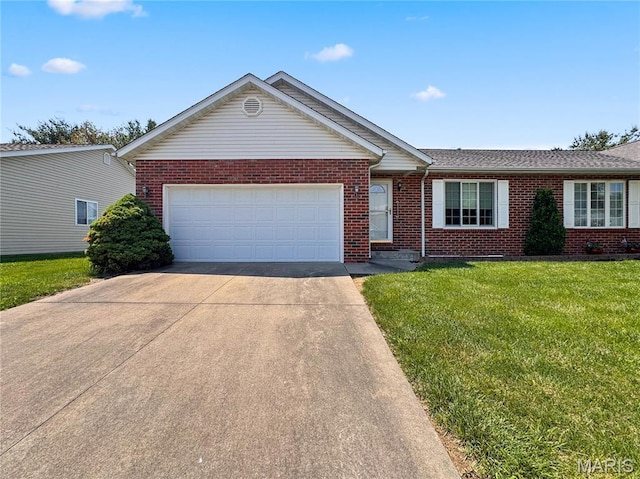 737 Marney Ln, Waterloo, IL 62298 - ranch-style home featuring brick siding, concrete driveway, a garage, and a front lawn