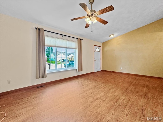 737 Marney Ln, Waterloo, IL 62298 - spare room with light wood-style floors, ceiling fan, and vaulted ceiling
