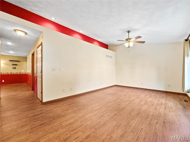 737 Marney Ln, Waterloo, IL 62298 - unfurnished room featuring ceiling fan, wood finished floors, and recessed lighting
