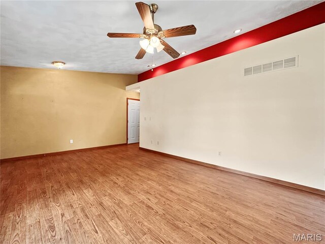 737 Marney Ln, Waterloo, IL 62298 - empty room with light wood-style floors, ceiling fan, and recessed lighting