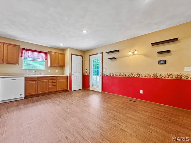737 Marney Ln, Waterloo, IL 62298 - kitchen with white dishwasher, light wood-style flooring, light countertops, brown cabinets, and recessed lighting