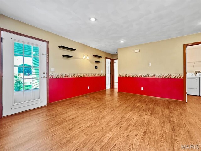 737 Marney Ln, Waterloo, IL 62298 - empty room featuring washing machine and clothes dryer, light wood finished floors, wainscoting, and recessed lighting
