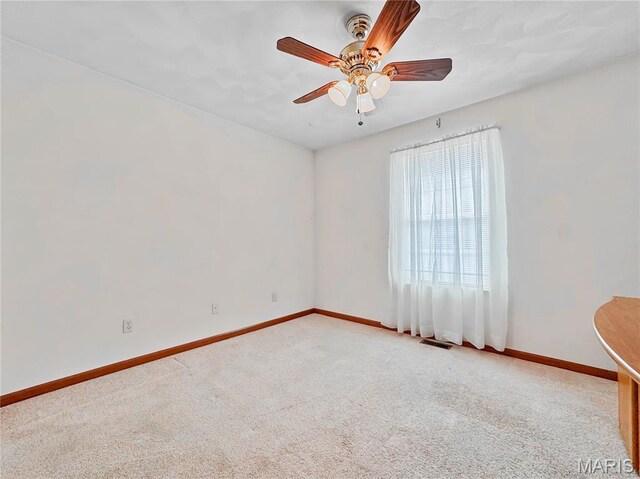 737 Marney Ln, Waterloo, IL 62298 - spare room with carpet flooring and a ceiling fan