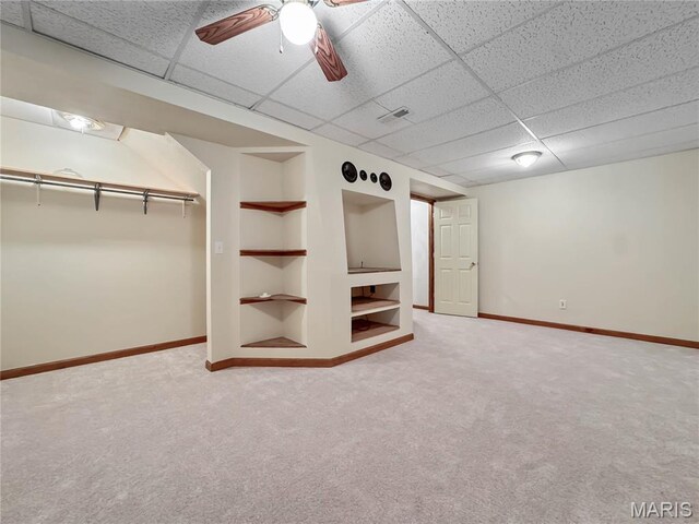 737 Marney Ln, Waterloo, IL 62298 - below grade area with built in features, a paneled ceiling, carpet floors, and ceiling fan