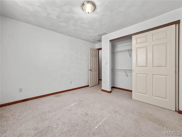 737 Marney Ln, Waterloo, IL 62298 - unfurnished bedroom featuring carpet flooring and a closet