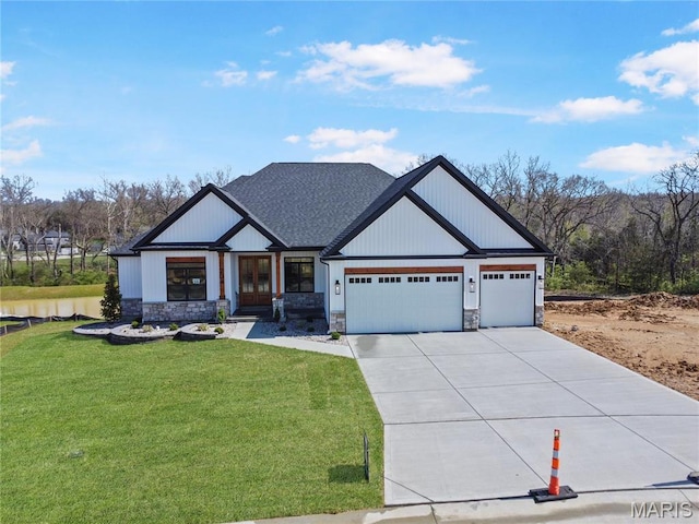 204 Great Bear Pass, Foristell, MO 63348 - modern farmhouse style home featuring a garage, stone siding, a front yard, driveway, and french doors