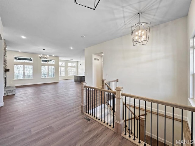 204 Great Bear Pass, Foristell, MO 63348 - stairs featuring a chandelier, wood finished floors, baseboards, and recessed lighting