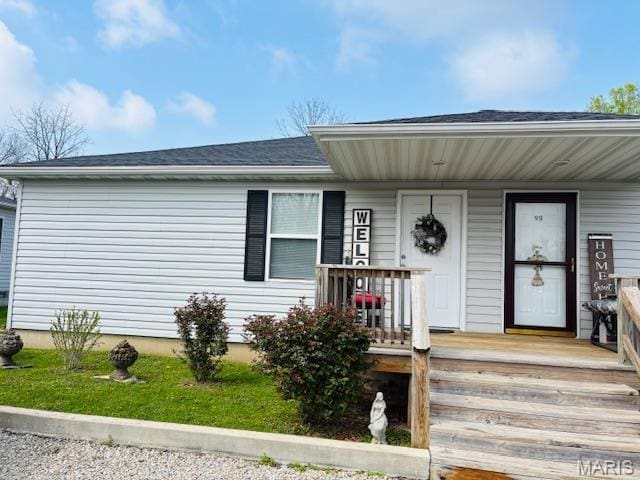 9 Mcleod St Unit A, Cuba, MO 65453 - view of front facade with covered porch and a shingled roof