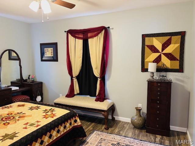 9 Mcleod St Unit A, Cuba, MO 65453 - bedroom featuring wood finished floors, baseboards, and a ceiling fan