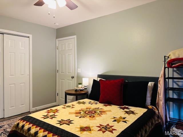 9 Mcleod St Unit A, Cuba, MO 65453 - bedroom featuring a ceiling fan, wood finished floors, and a closet