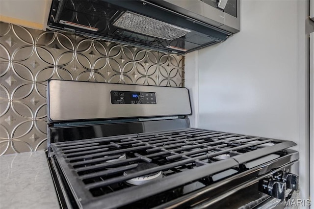 450 Michigan, Lebanon, MO 65536 - kitchen featuring stainless steel range with gas cooktop and ventilation hood