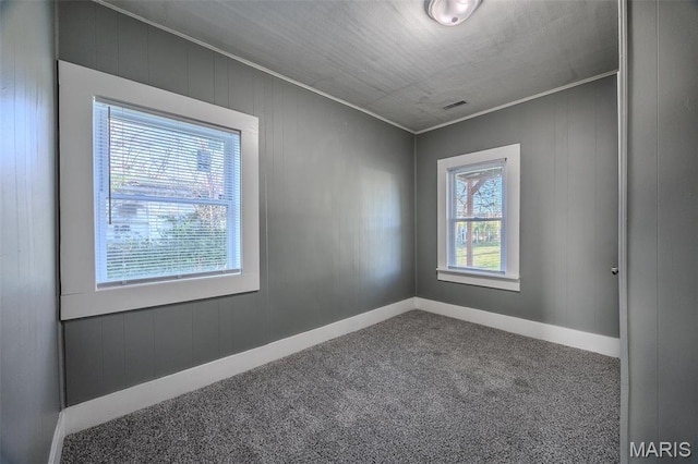 450 Michigan, Lebanon, MO 65536 - empty room featuring carpet, crown molding, and baseboards