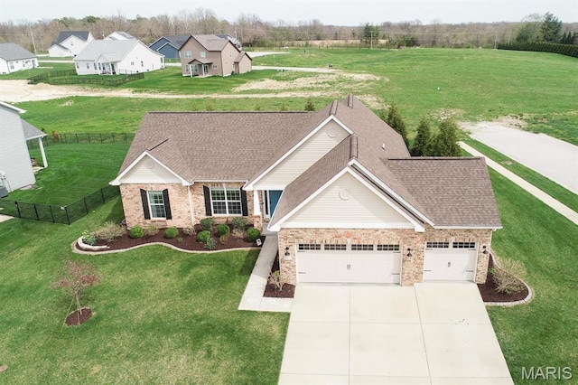 view of front of property featuring a garage, brick siding, and driveway