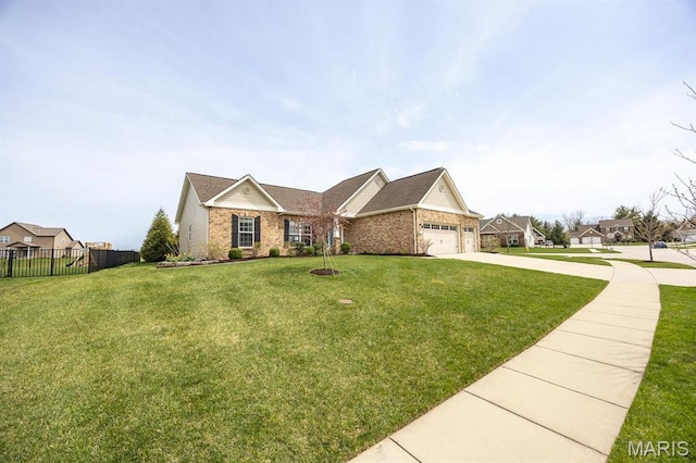 view of front of property featuring an attached garage, brick siding, and driveway