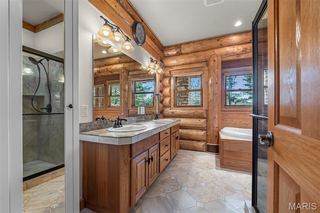 3333 State Highway 177, Cape Girardeau, MO 63701 - full bathroom with rustic walls, healthy amount of natural light, a shower stall, double vanity, and recessed lighting