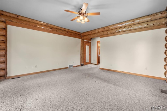 3333 State Highway 177, Cape Girardeau, MO 63701 - carpeted empty room with a ceiling fan, rustic walls, and baseboards