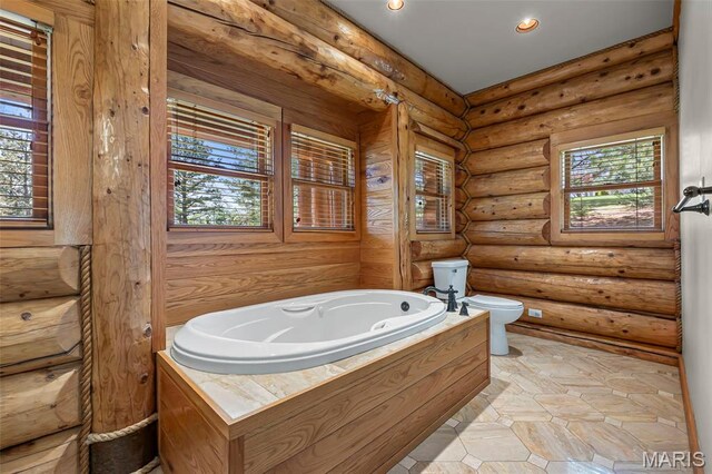 3333 State Highway 177, Cape Girardeau, MO 63701 - bathroom featuring toilet, healthy amount of natural light, a jetted tub, rustic walls, and recessed lighting