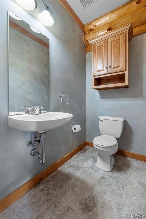 3333 State Highway 177, Cape Girardeau, MO 63701 - half bathroom with toilet and baseboards