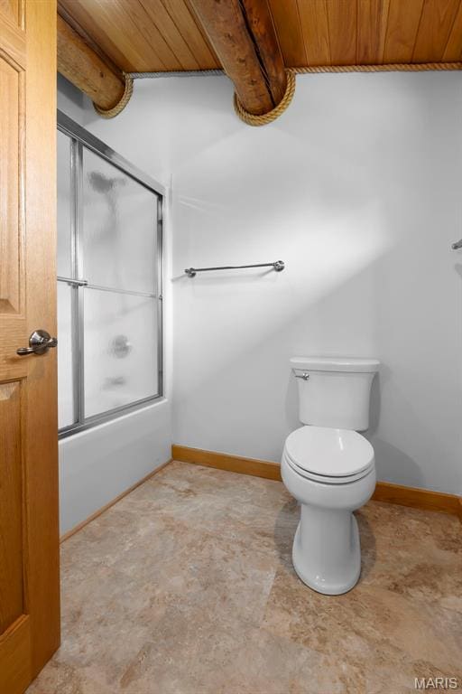 3333 State Highway 177, Cape Girardeau, MO 63701 - bathroom featuring combined bath / shower with glass door, toilet, and baseboards