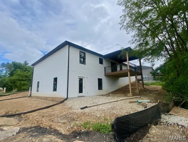101 Carmel Ln, Washington, MO 63090 - back of house featuring a balcony