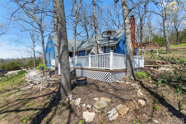 276 Cheyenne Ln, Perryville, MO 63775 - rear view of house with a chimney and a wooden deck