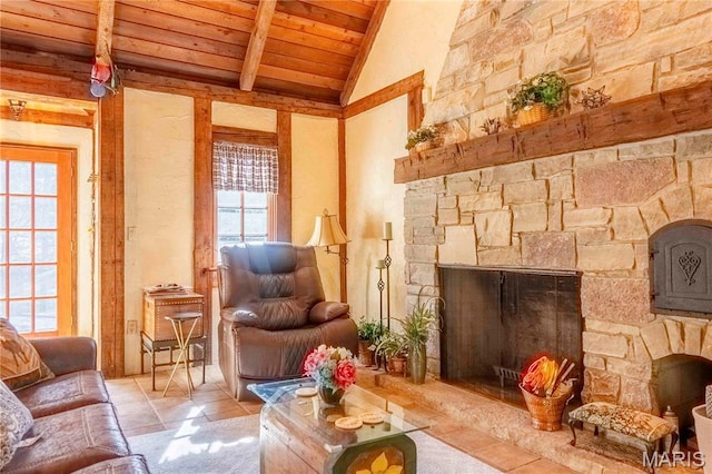 tiled living area featuring a fireplace, plenty of natural light, wooden ceiling, beamed ceiling, and high vaulted ceiling