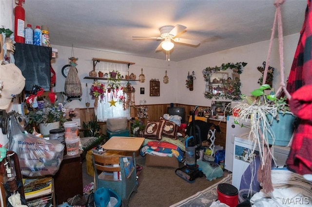 misc room featuring ceiling fan and carpet flooring